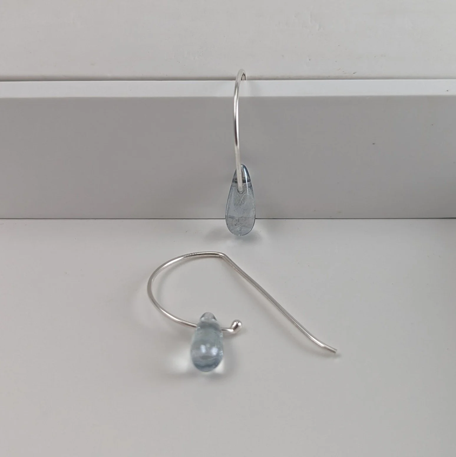 Lumi light Blue tiny glass teardrop earrings