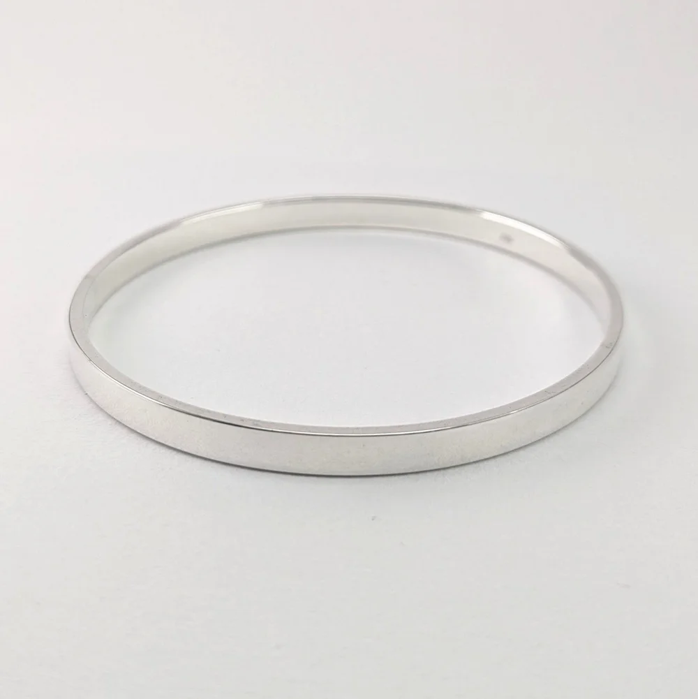Flat sterling silver handmade bangle — Georgina Dunn Jewellery