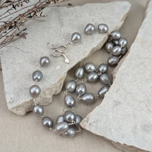 Grey teardrop shaped freshwater pearl necklace with snake