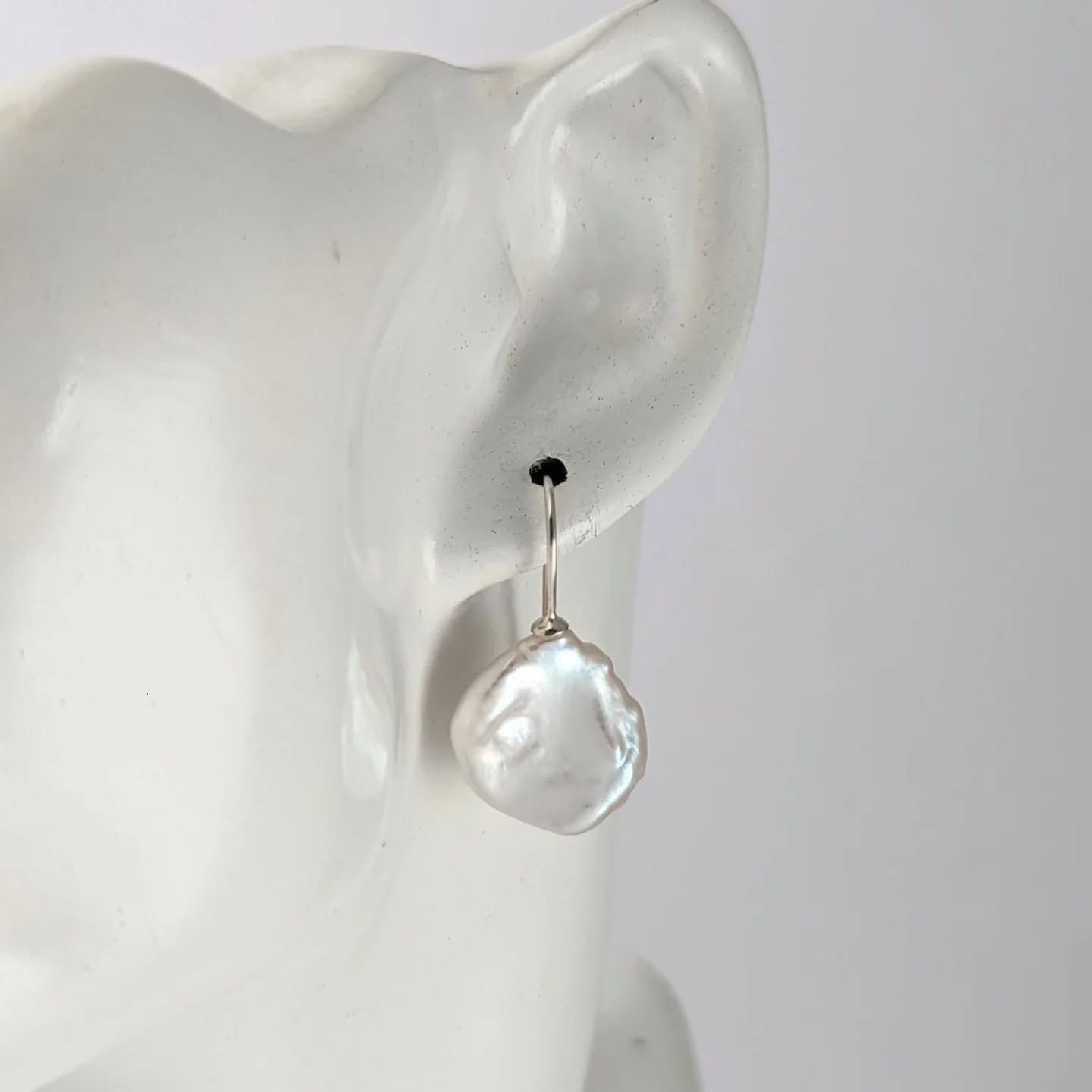 Unique pearl drop earrings made with white keshi freshwater pearls make an excellent choice to add to your jewellery collection. These drop earrings are sure to draw the eye of all around you, plus no rules about when to wear them, jazz up that outfi