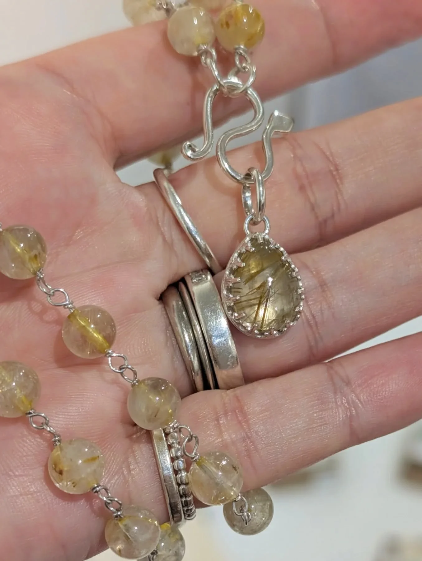 This is one of the necklaces that was displayed at the JMGQ Mother's market at the Ruth Randall Gallery at Mt Coot-tha last weekend. The pendant is removable and you can add your own pendants to create something uniquely you. All handmade with a mix 