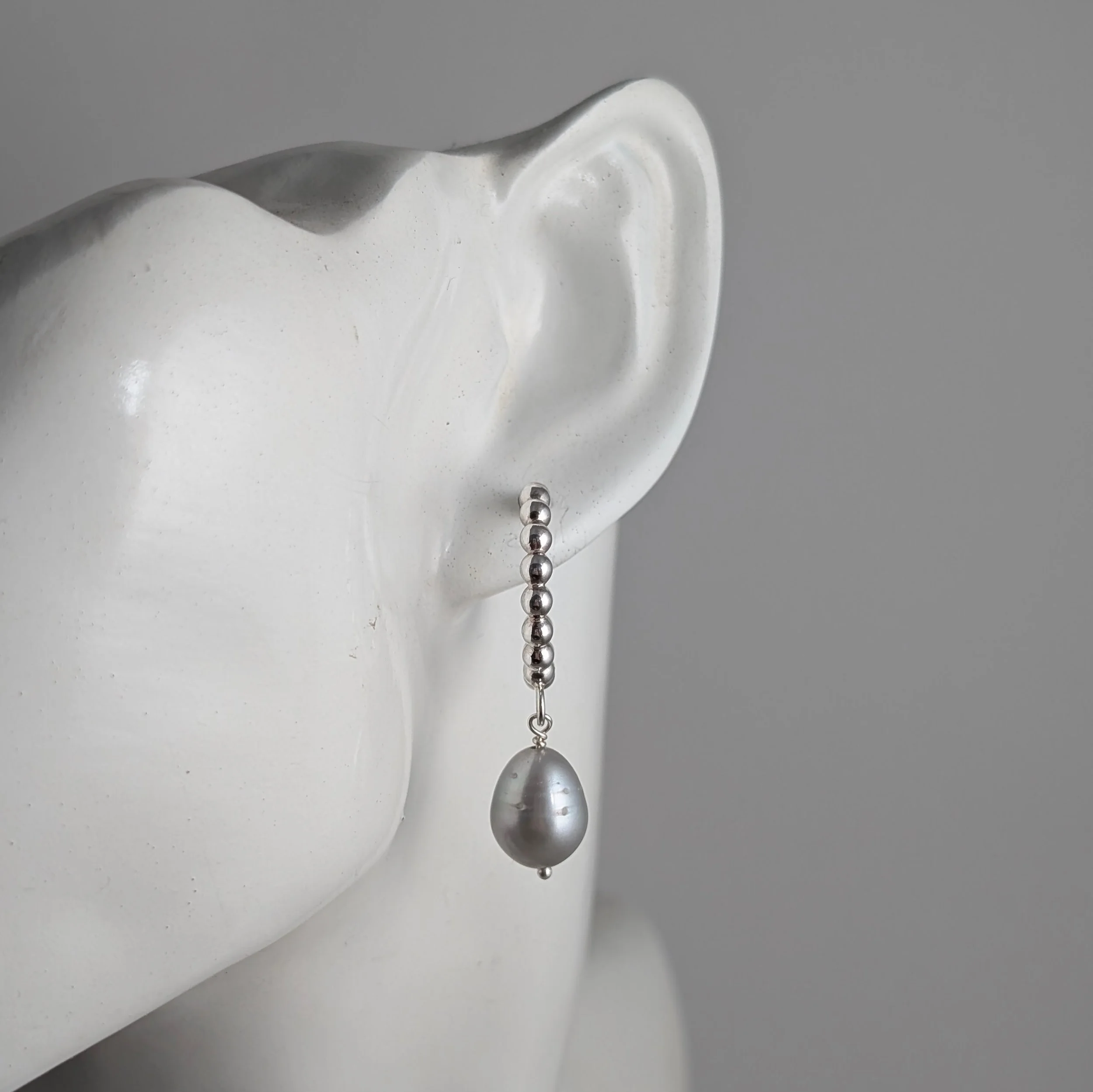 Beaded-hoops-with-grey-pearls-on-ear-front.jpg