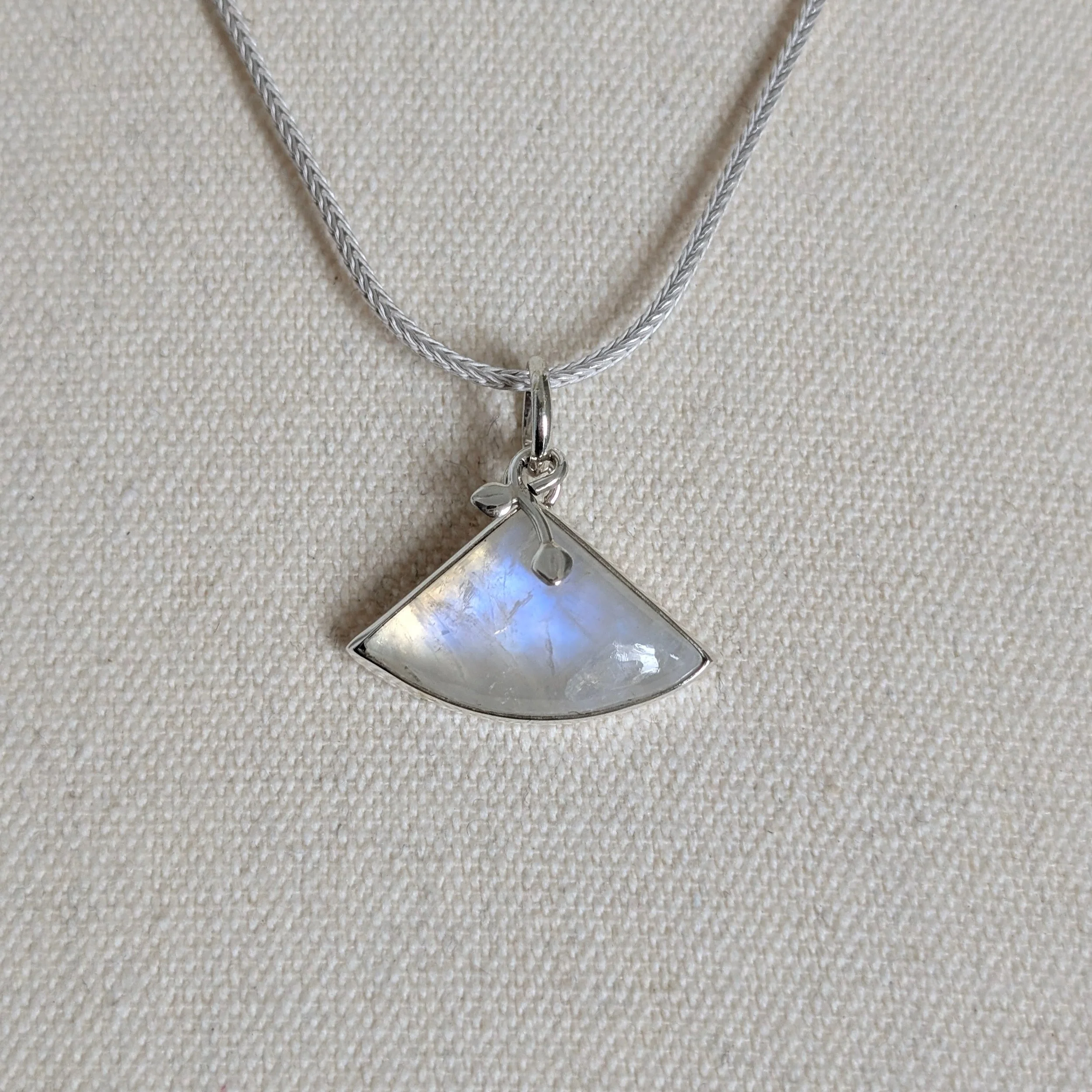 Fan-shaped moonstone pendant on sterling silver foxtail chain