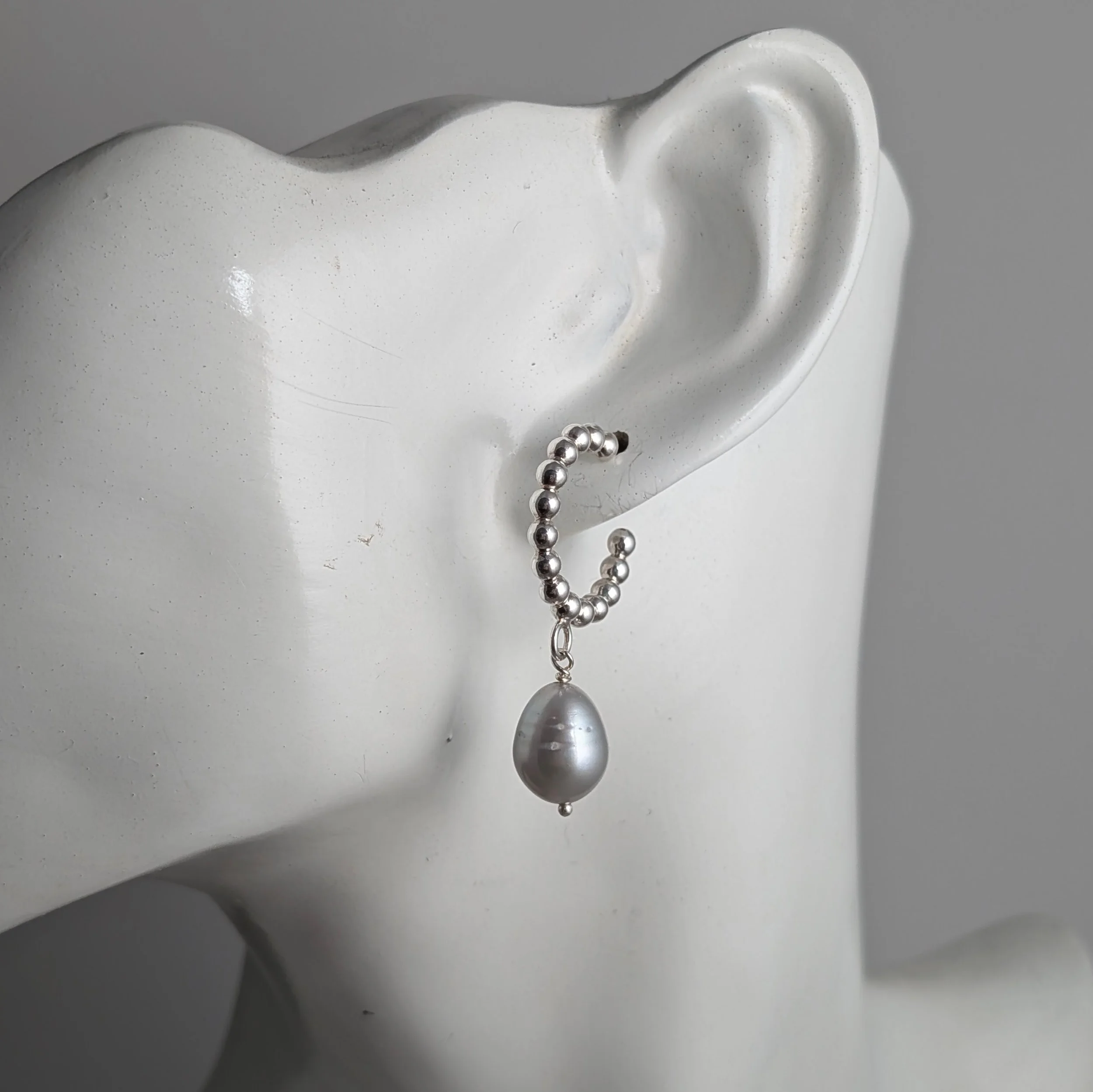 Beaded-hoops-with-grey-pearls-on-ear-side.jpg