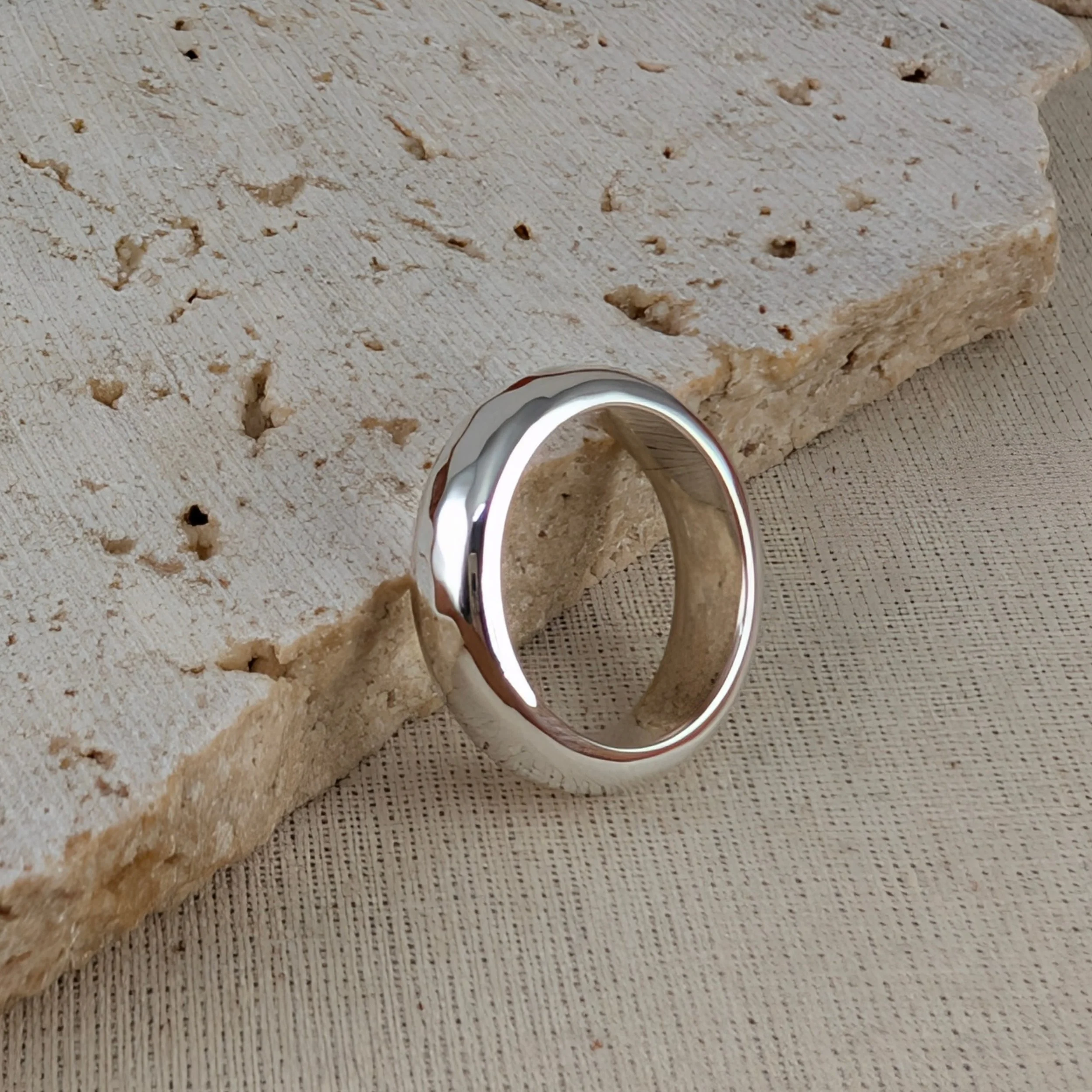 Half round ring with hammered texture v1.jpg