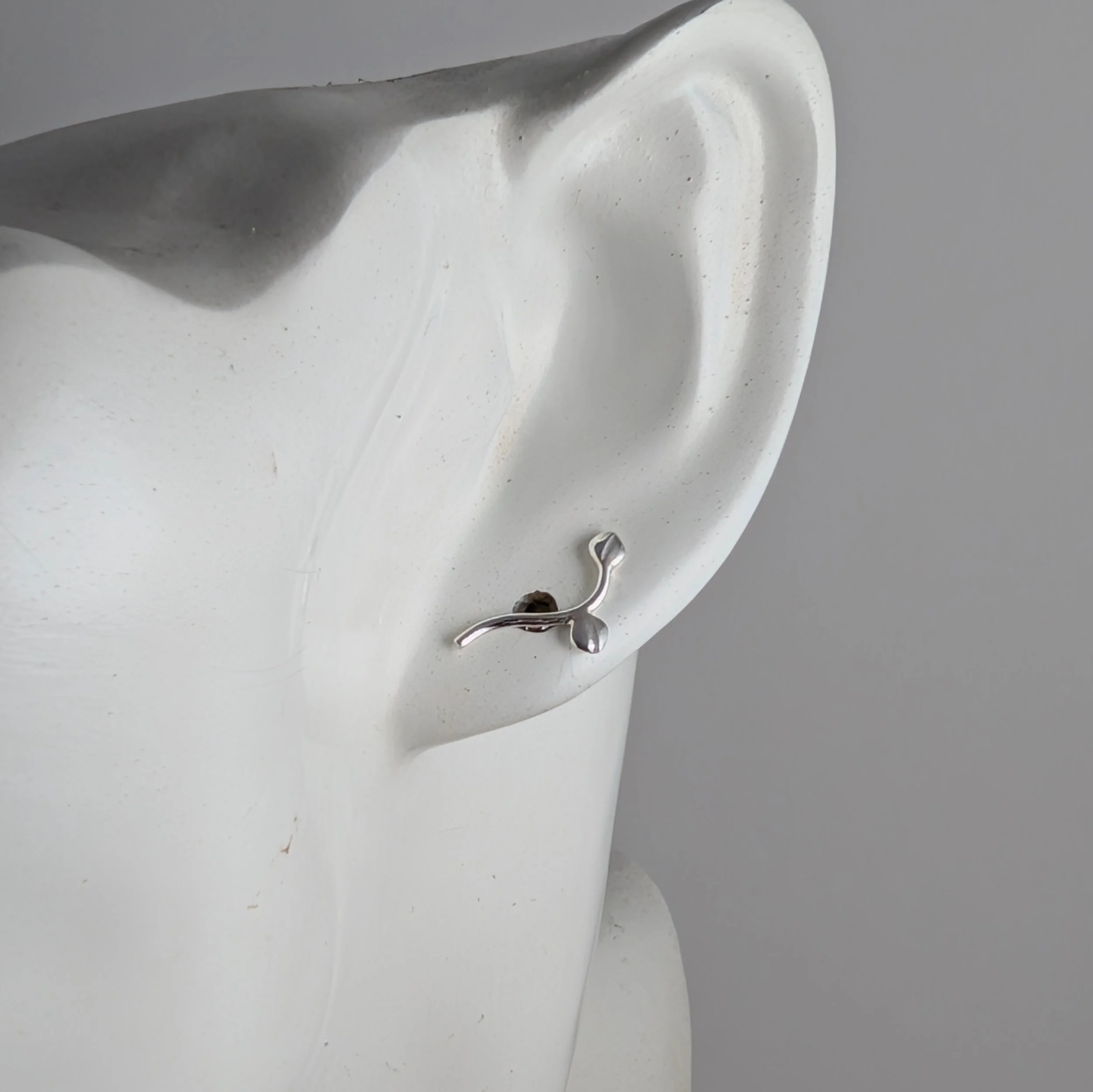 Three-Leaves-Stud-Earrings-on-ear.jpg