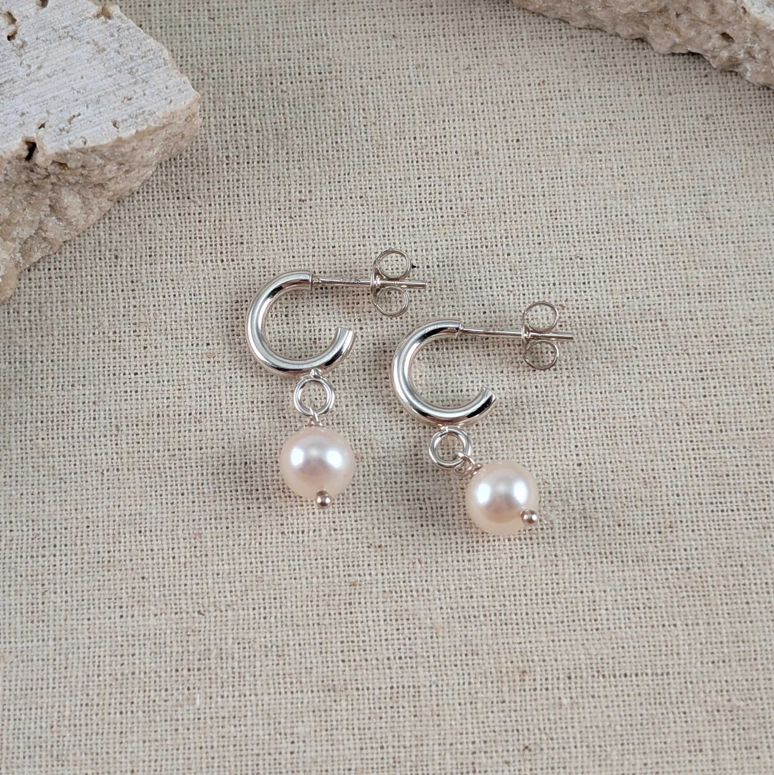 Tiny-2mm-hoops-with-white-oval-pearls-v1.jpg