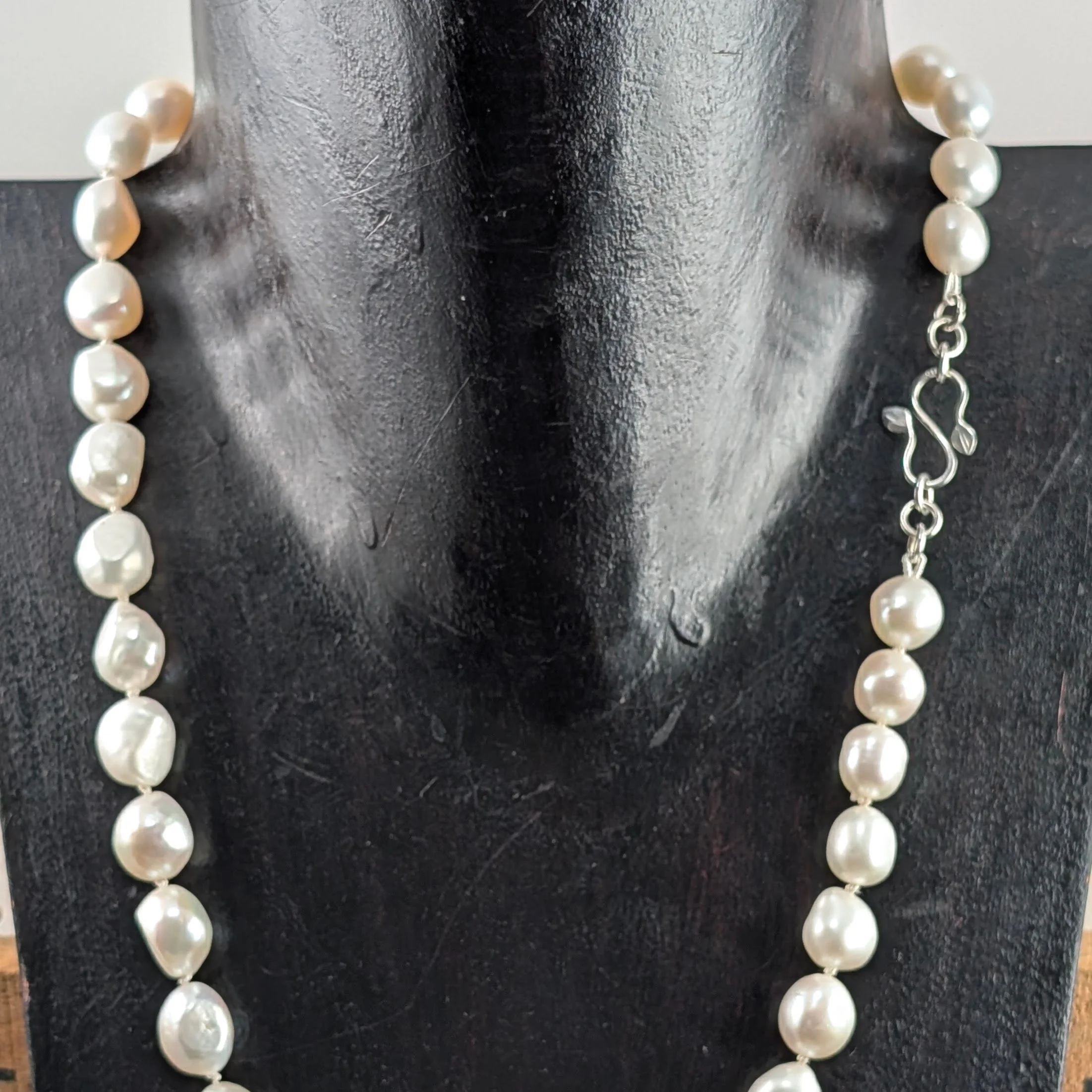 Knotted pearl necklace with leaf catch v3.jpg
