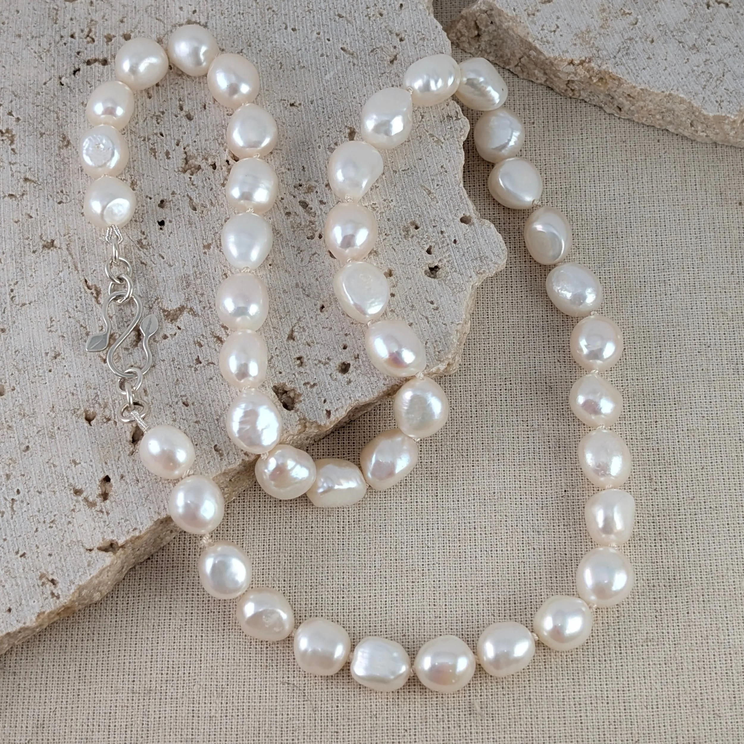 Knotted pearl necklace with leaf catch v2.jpg