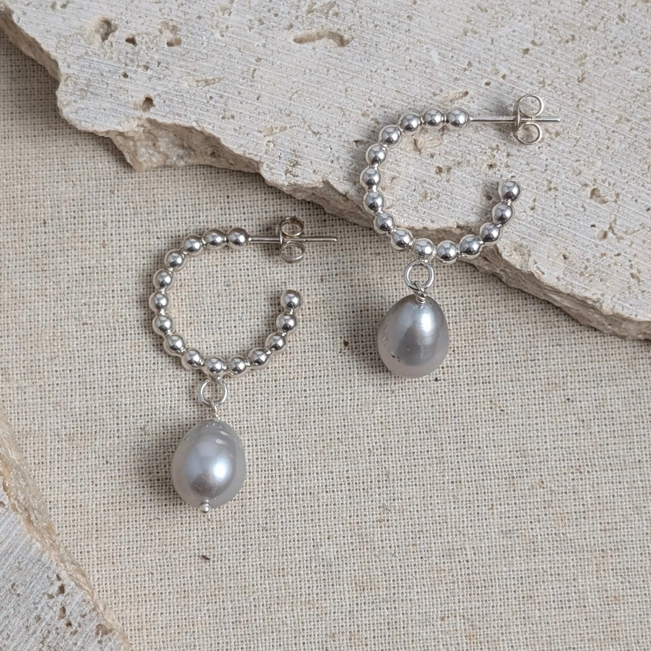 Beaded wire hoop earrings with grey freshwater pearls