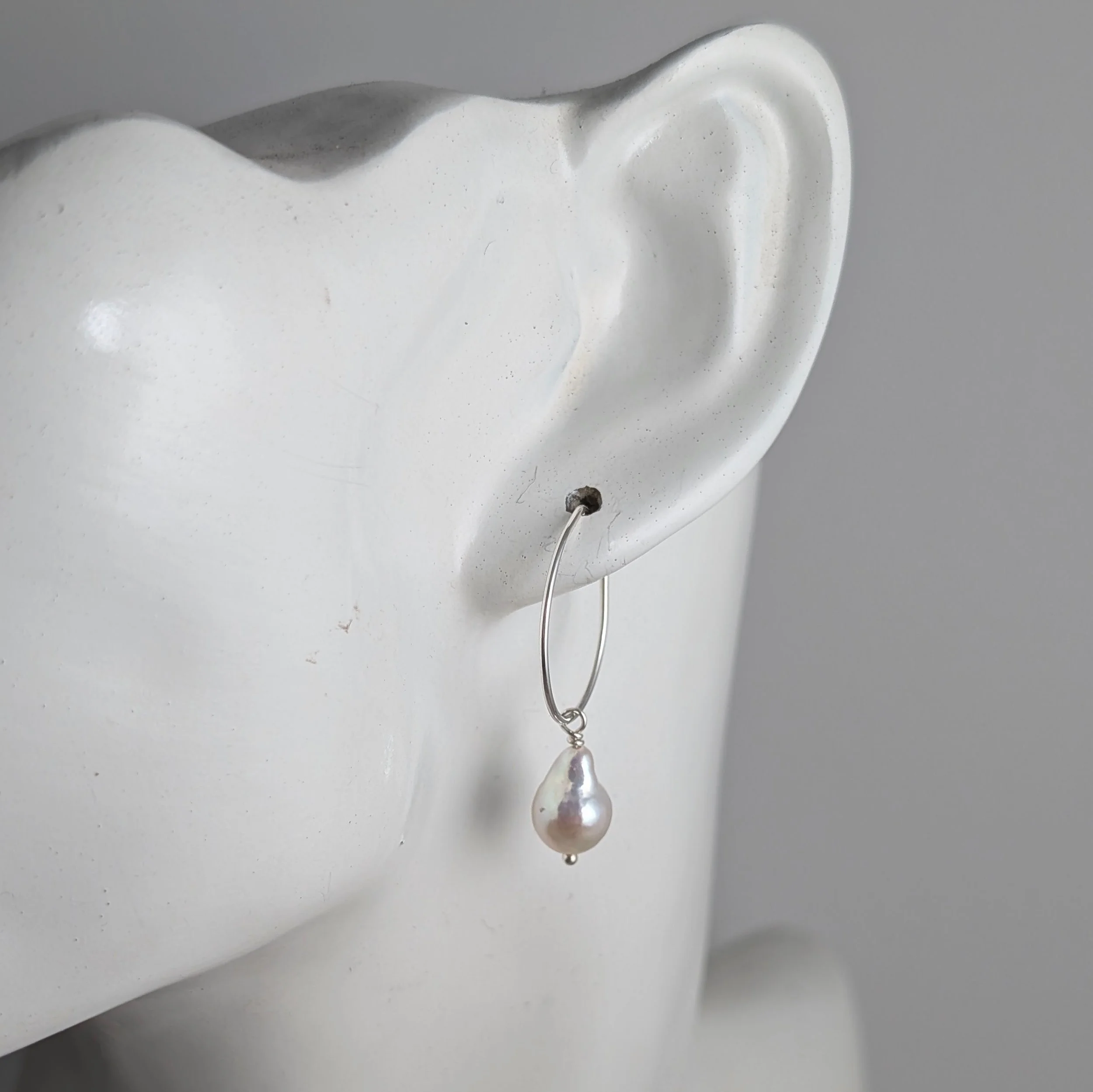 Short-hoop-baroque-pearls-on-ear.jpg