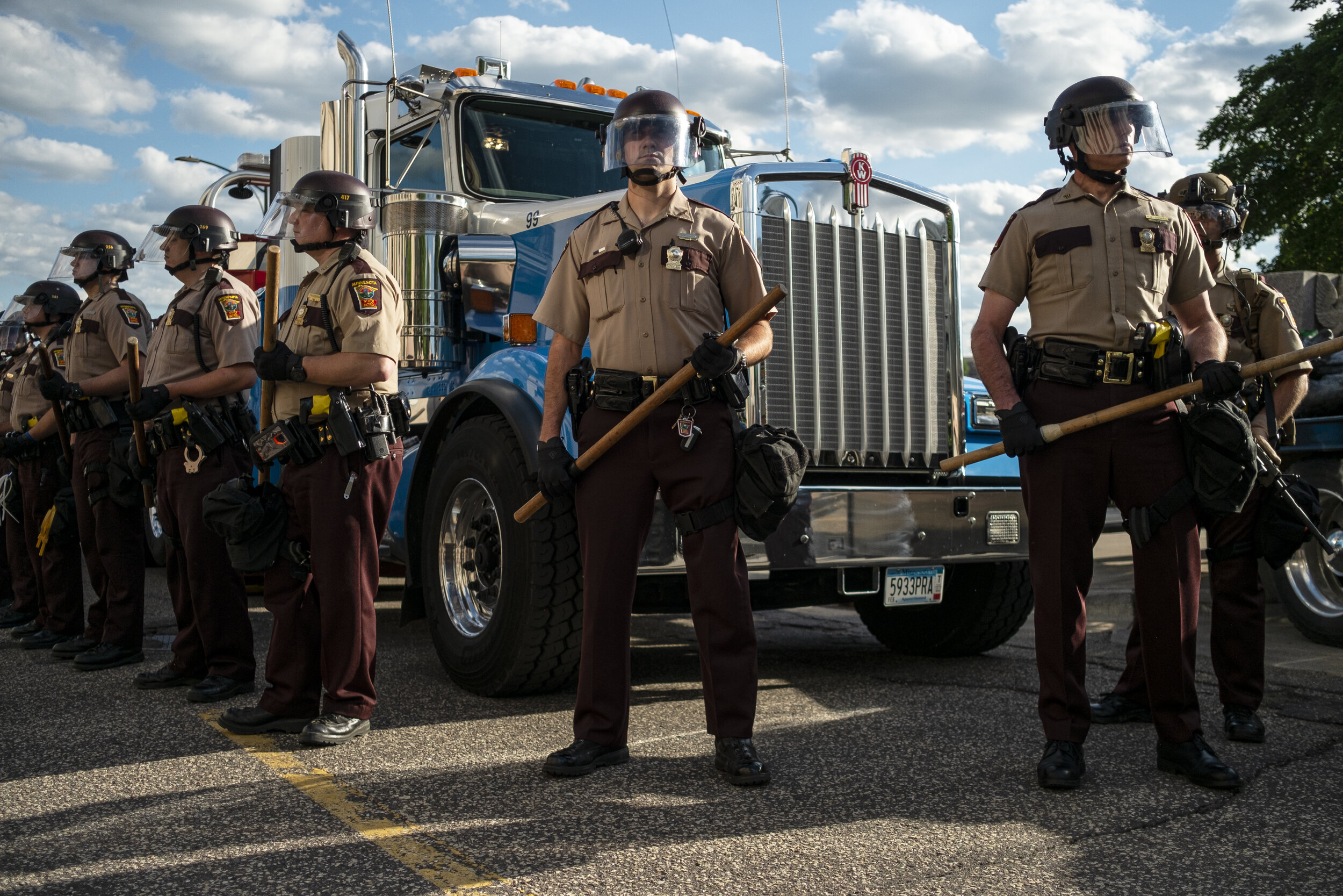  State troopers guard the semi ordered to remove the newly toppled statue of Christopher Columbus at the Minnesota State Capitol on Wednesday, June 10th, 2020. On the other side of the street a protest was organized by the American Indian Movement (A