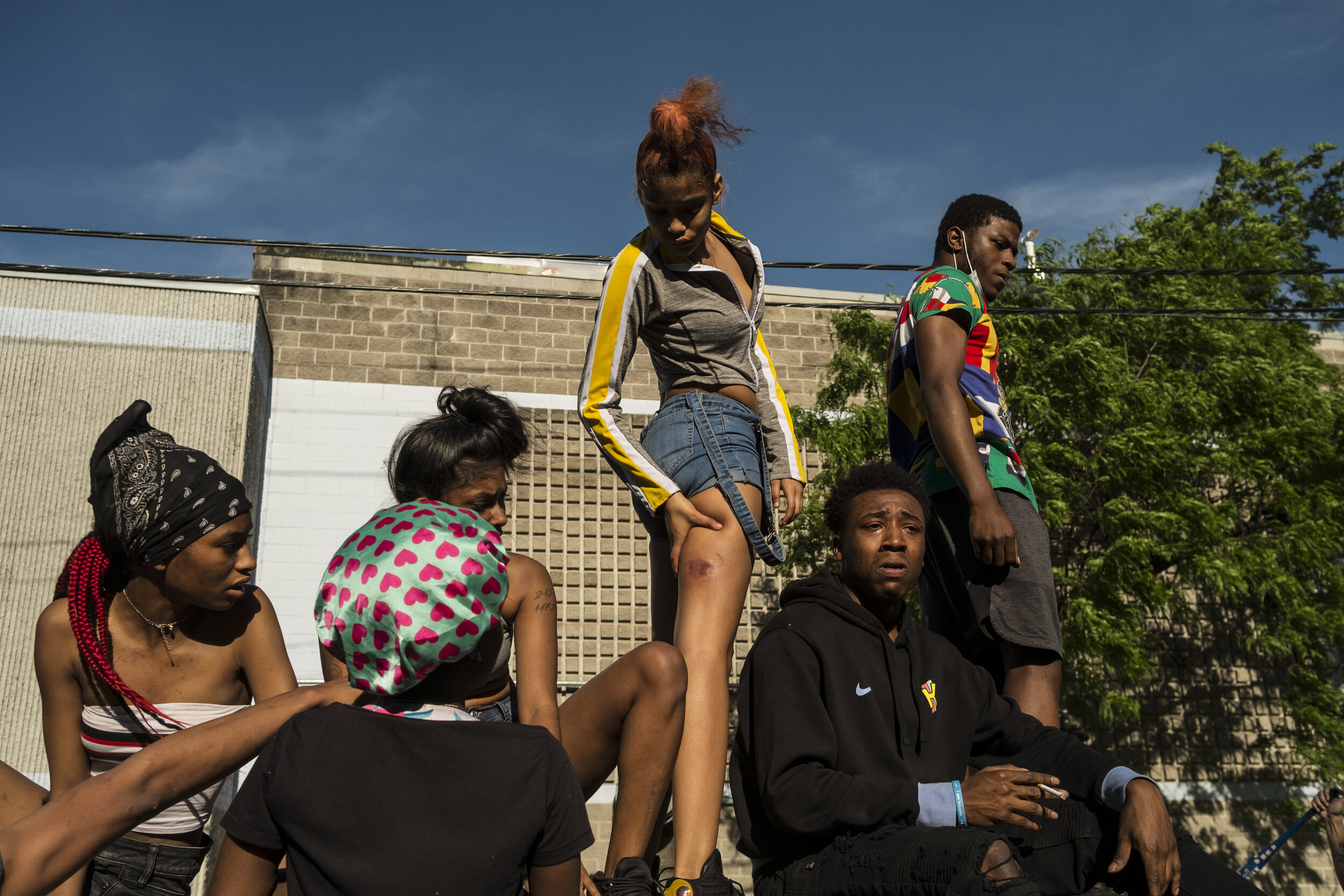  A group of young people travel on top of a vehicle during a march in south Minneapolis on Thursday, May 28th, 2020. In the weeks and months that followed the police murder of George Floyd, protests, marches, vigils and community gatherings were atte