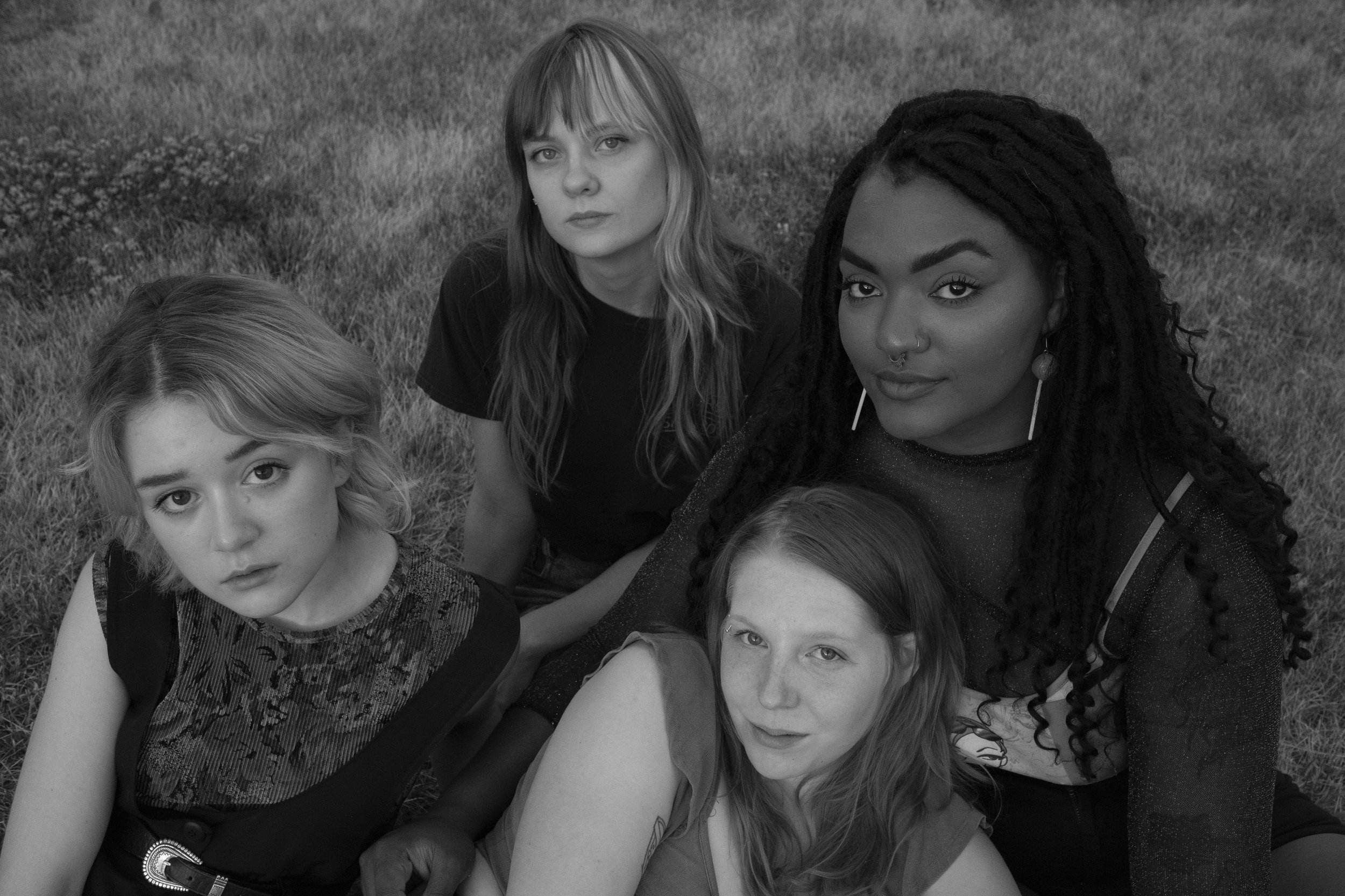  Clockwise from left: Natalie, Emily, Nadirah, and Kathy of the Minneapolis band Gully Boys, outside of their studio in St. Paul on Thursday, June 24th, ahead of their first show since the pandemic. The band will perform at a Pride block party at the