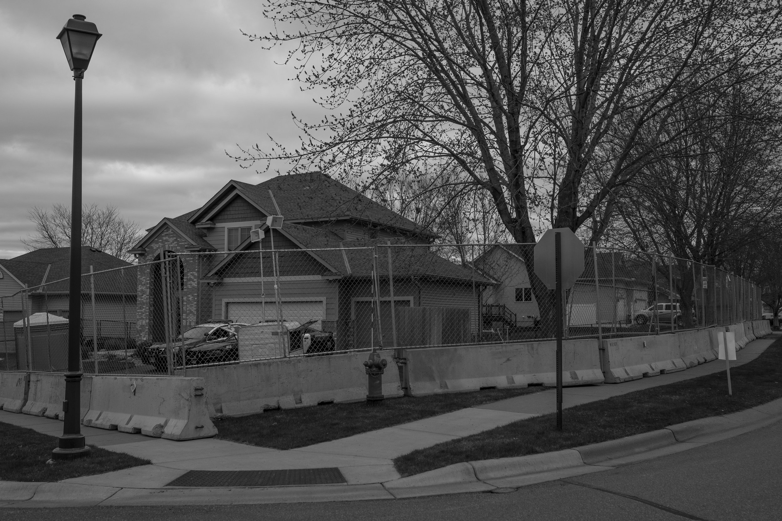  Two police cars park in Kim Potter’s driveway in Champlin, Minnesota on Thursday, April 15th. Potter is the former Brooklyn Center police officer who shot and killed Daunte Wright, a 20-year-old Black man who was unarmed. (Brooklynn T. Kascel/Redux)