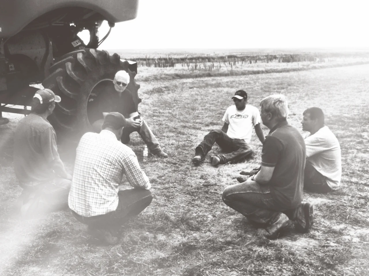 One of my favorite farm photos - my dad is the one sitting in the combine tire and my brother is in the bright white T-shirt.