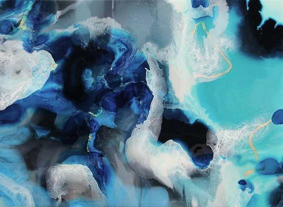Abstract fluid art with shades of blue, white, black, and hints of gold.