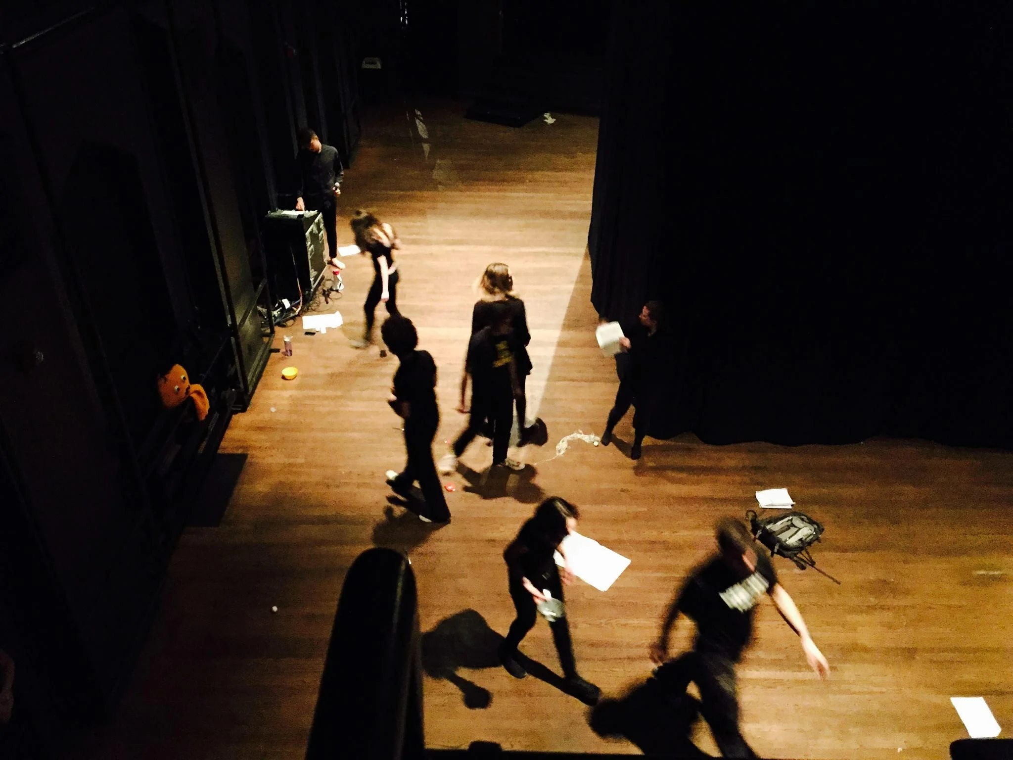 Overheard was a completely aural experience. The performers moved around the space while the audience sat in the dark center of the room (top right of picture)