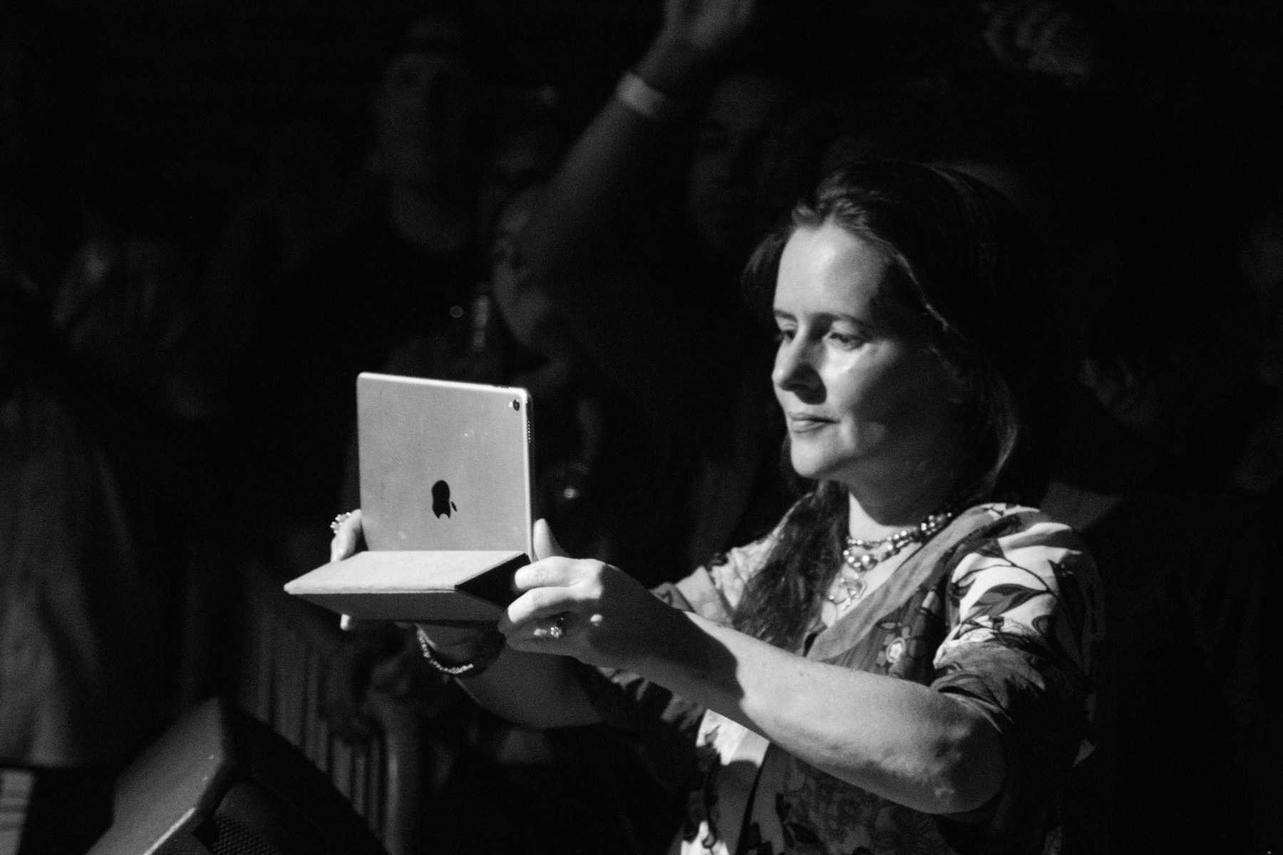 She held this iPad up for the entirety of the show