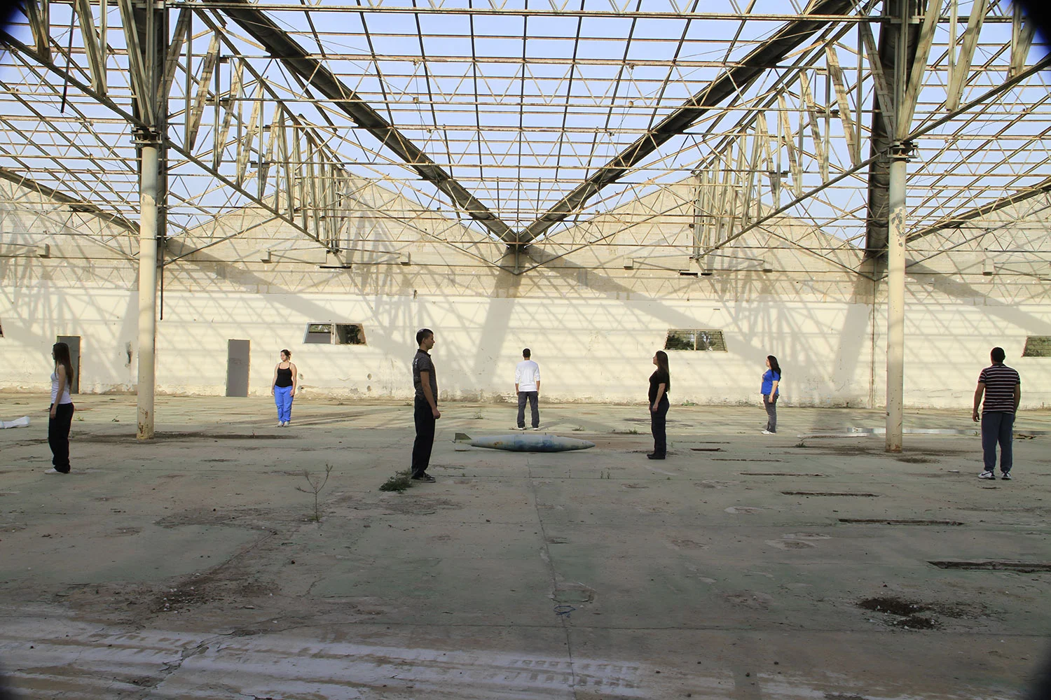 The youngsters inside the deserted OF-AR factory with a missile 2010