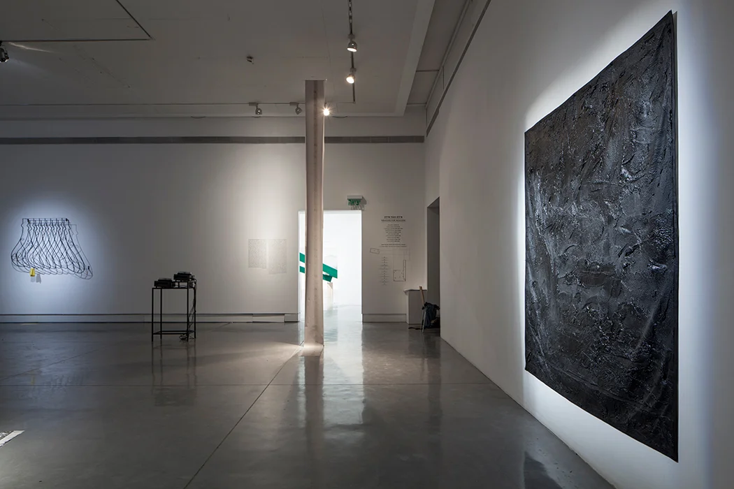 Installation View: to the right : Black Ground, 2013, bituminous mastic, acrylic, gesso on canvas, Size: 197.5 X 197.5 CM at Petach Tikva Museum of Art. Photographer: SJM 