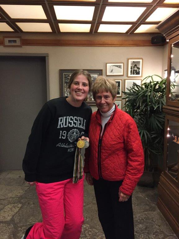 Nancy Greene at Cahilty Lodge showing Jess her Olympic medals