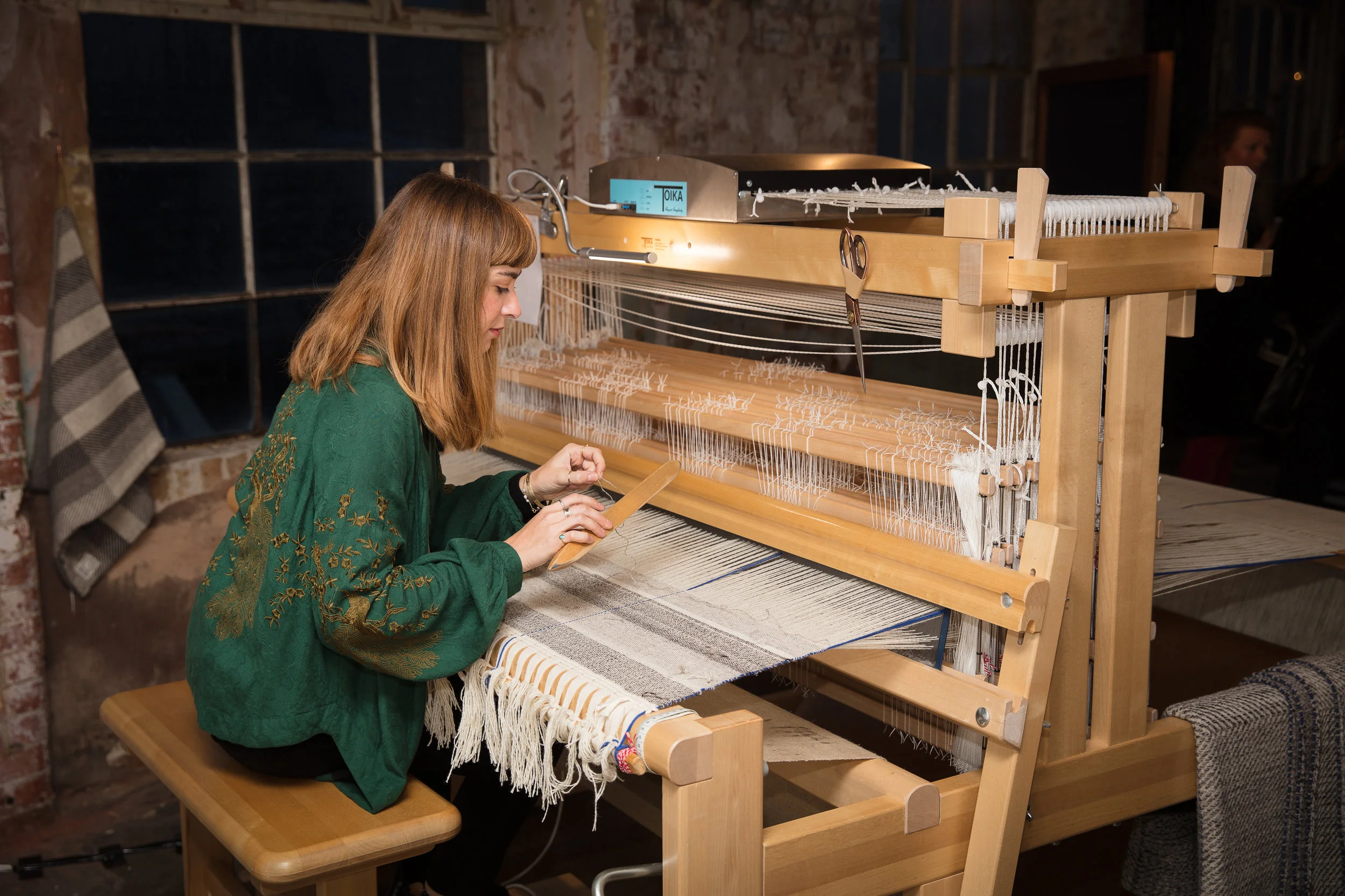 Maria Sigma hand-weaving at The Future of Craft, Oxo Tower Wharf CREDIT: DAN WEILL