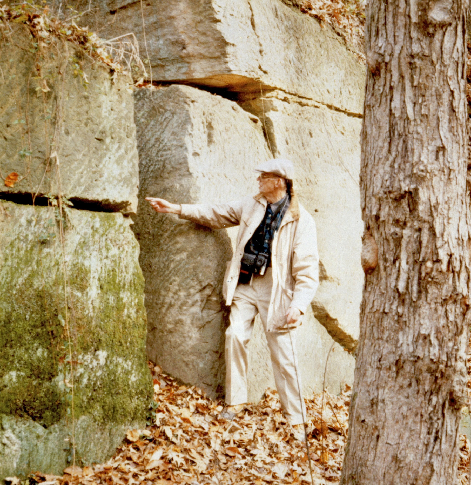 Lee Nelson examines Aquia Creek sandstone at the quarry that supplied stone for the White House.