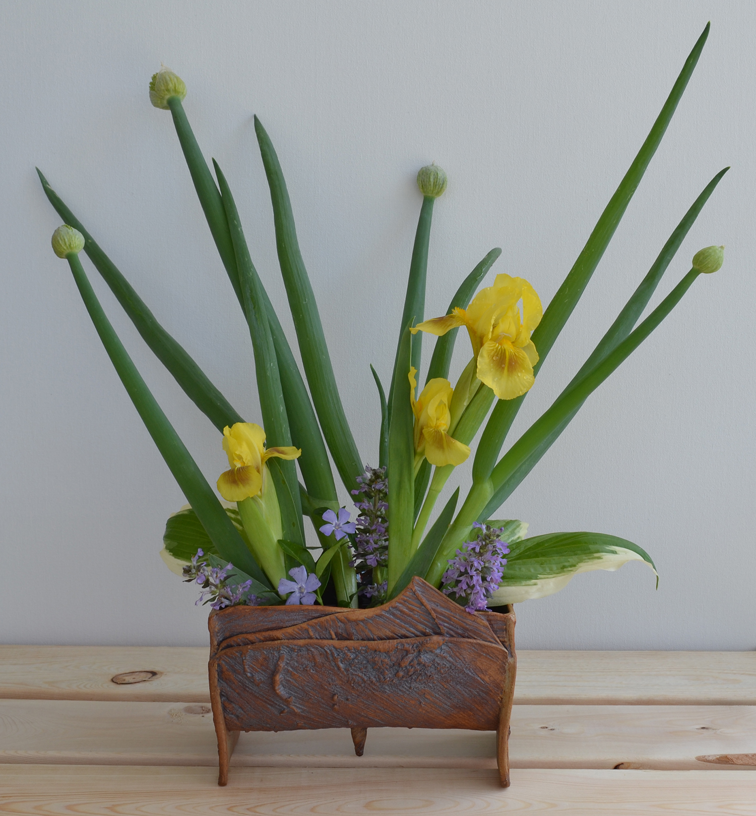 Half-round Vessel with Flower Arrangement