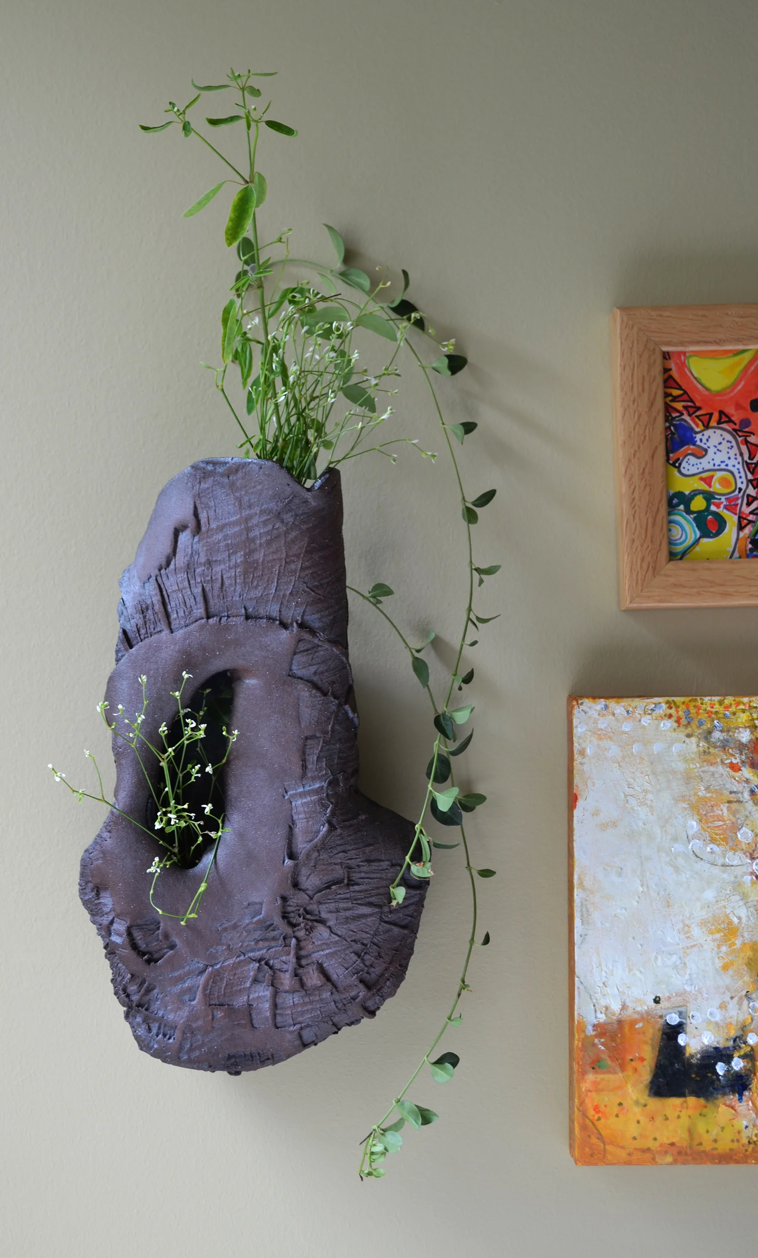 Wall Vessel with Flower Arrangement