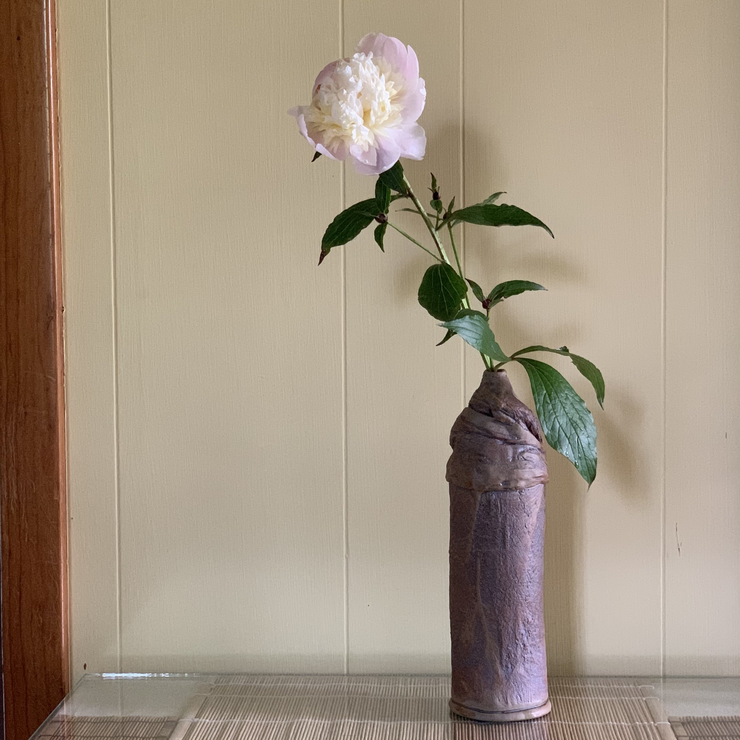 These vases are perfect for gardeners because very few blooms need to be cut to create a beautiful arrangement. The pottery, completed by the addition of plant materials, brightens whatever room in which they are placed!
