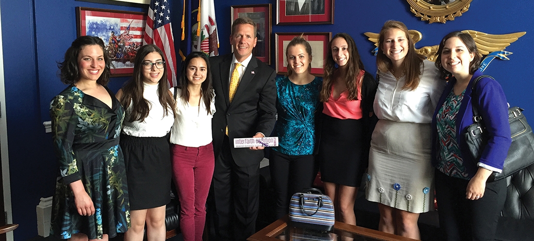 JWI staff and interns deliver the Interfaith Coalition's call to action to Rep. Bob Dold on June 9, 2016.