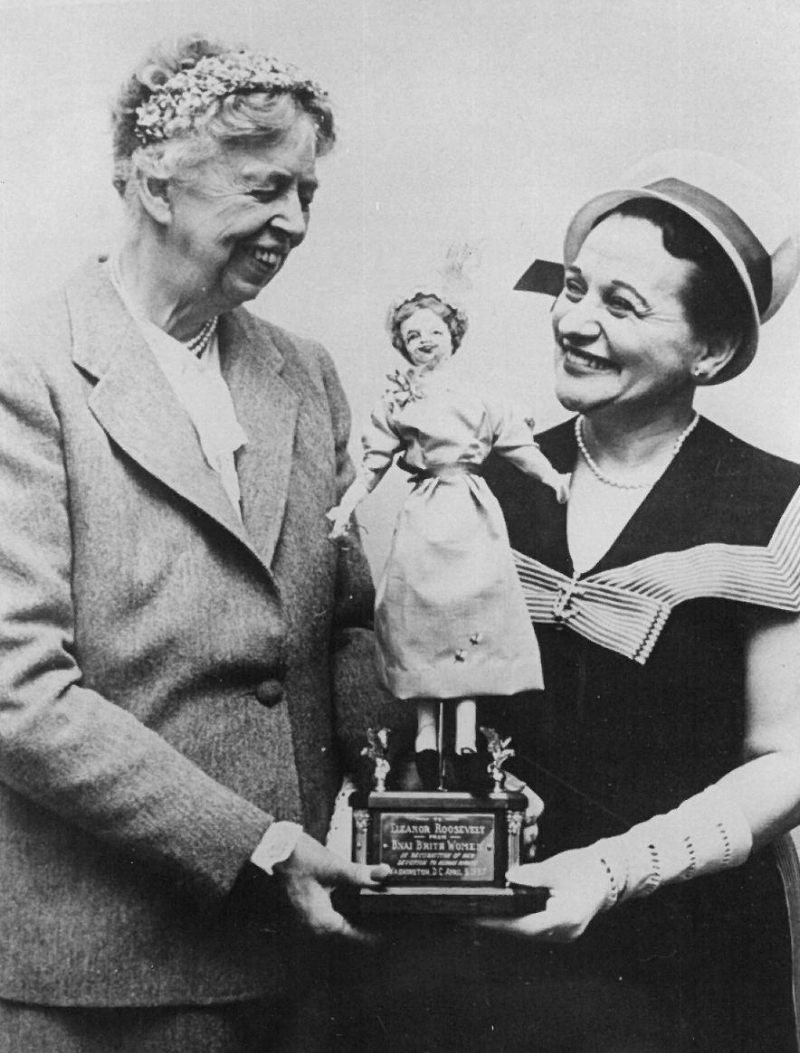 In 1958, former First Lady Eleanor Roosevelt accepts a Doll for Democracy from Anita Perlman, president of B’nai B’rith Women which later became JWI. The doll was part of the organization’s nationwide program for schoolchildren to promote tolerance and understanding between individuals of different backgrounds.