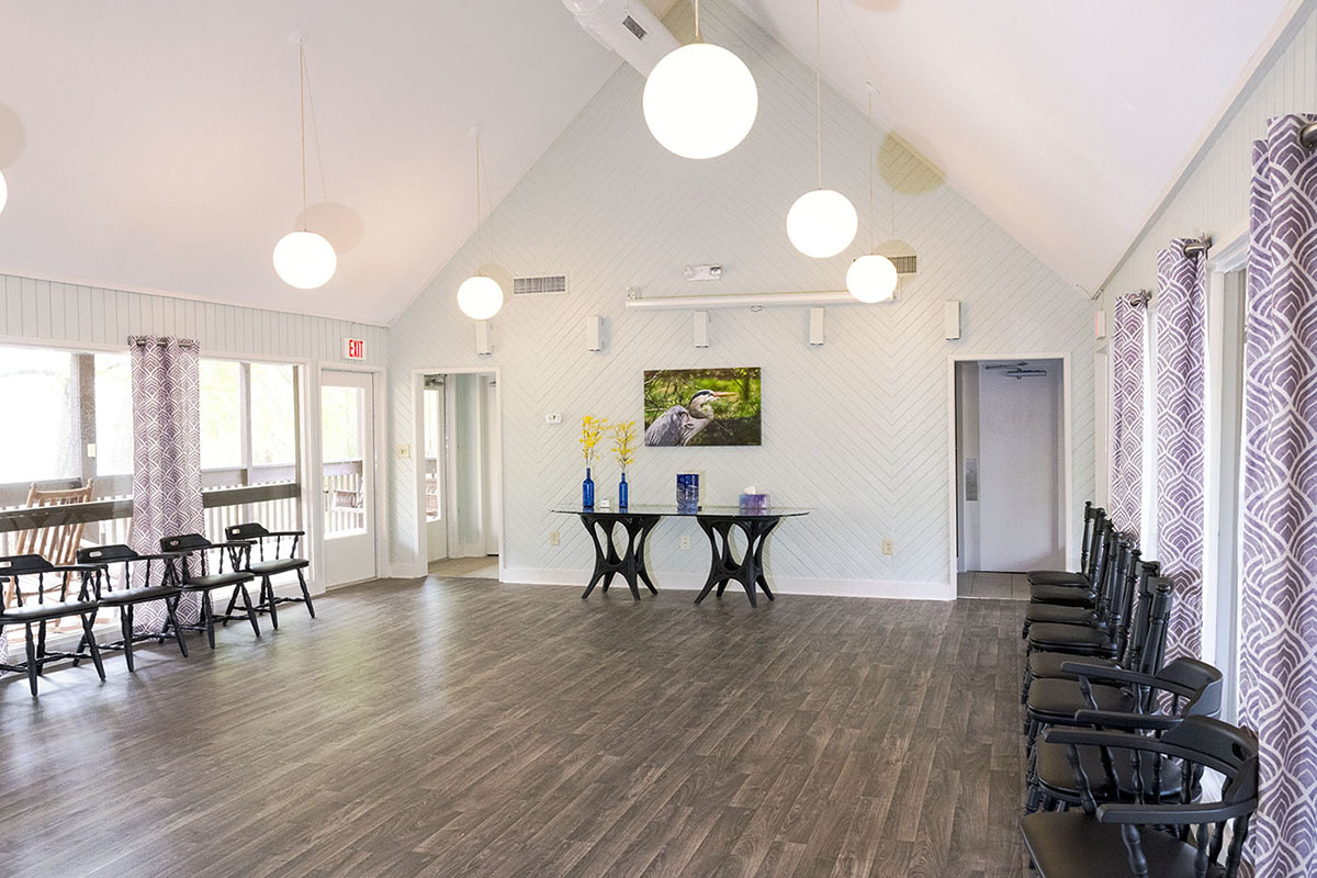 Party room with spectacular natural daylight from floor-to-ceiling windows