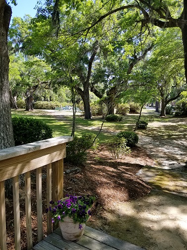 Imagine a grand entrance down the steps to your wedding guests and reception on the shady lawn.