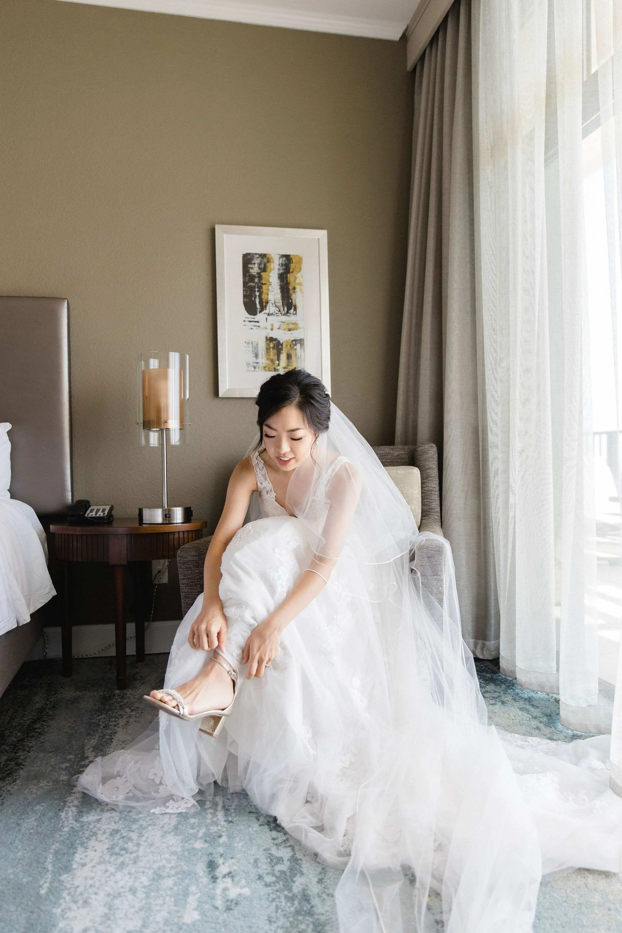 bride putting on shoes