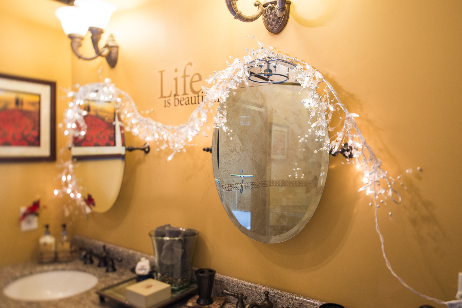 2 mirrors on a wall in bathroom