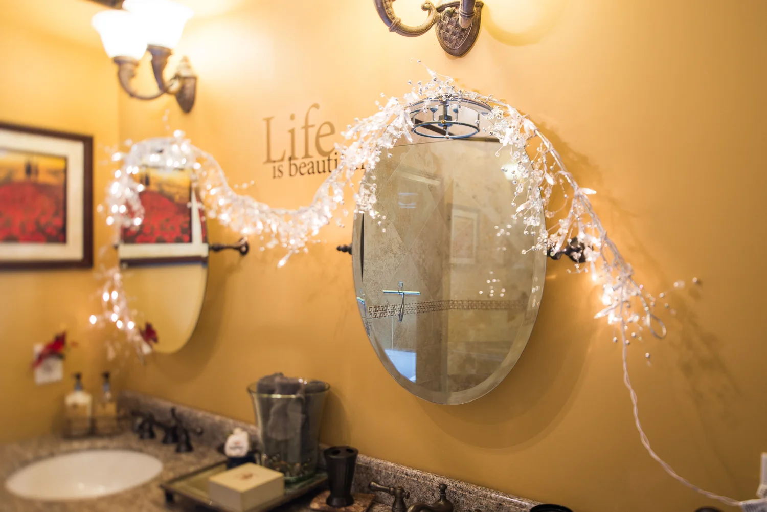 2 mirrors on a wall in bathroom