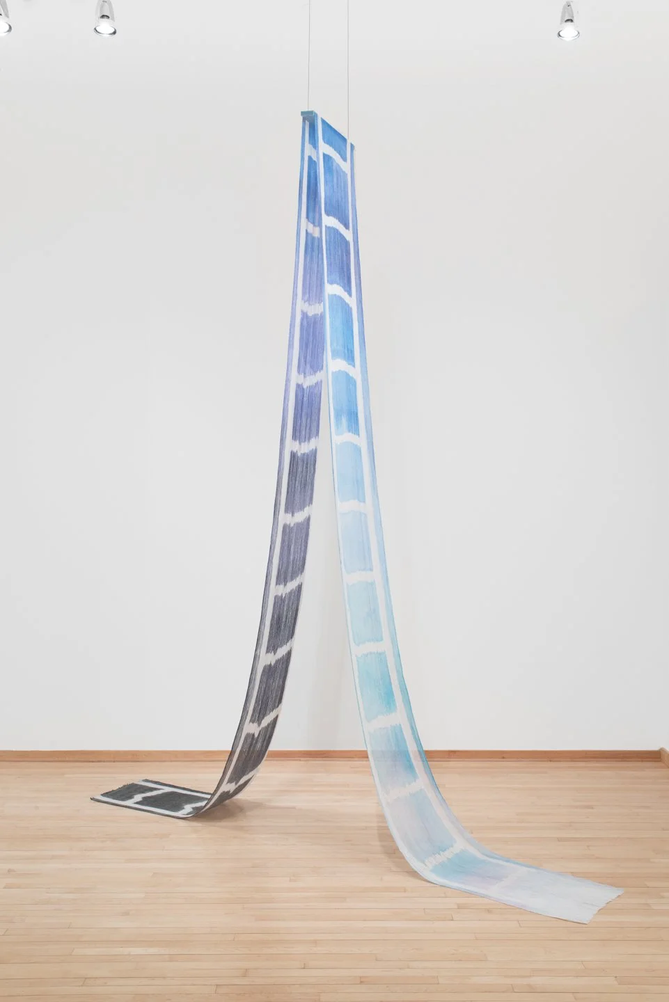   the way back   handwoven cotton, dye, wood  12’ x 7’ x 18”  2024  photo credit:  Neighboring States  