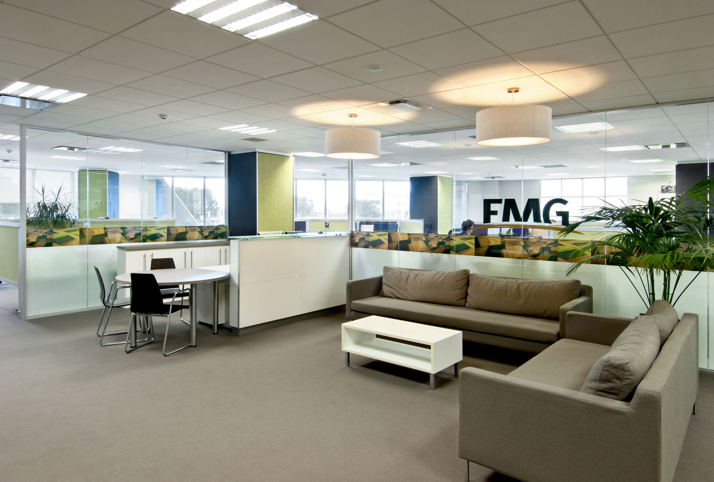 FMG Headquarters Fitout Following on from FMG’s Corporate Office in Wellington, S&T were asked to refurbish their Head Office in Palmerston North where they had been based for a number of years in a building famous for it’s ‘crystaline’ shape. This presented unique challenges but resulted in a polished interior design.