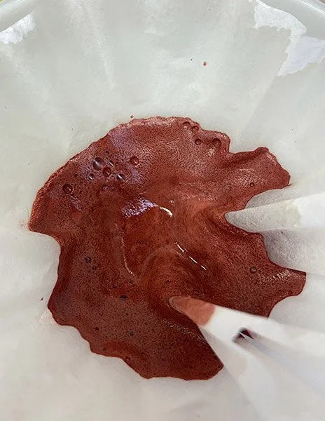 Straining madder lake