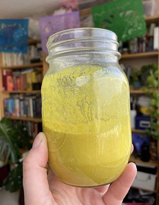  Letting the foam settle after adding the calcium carbonate to the weld and alum mixture 