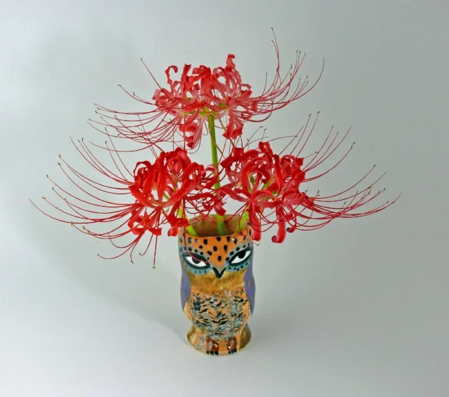 one of 25 owl vases, each on with a unique personality! by Cathy Kiffney