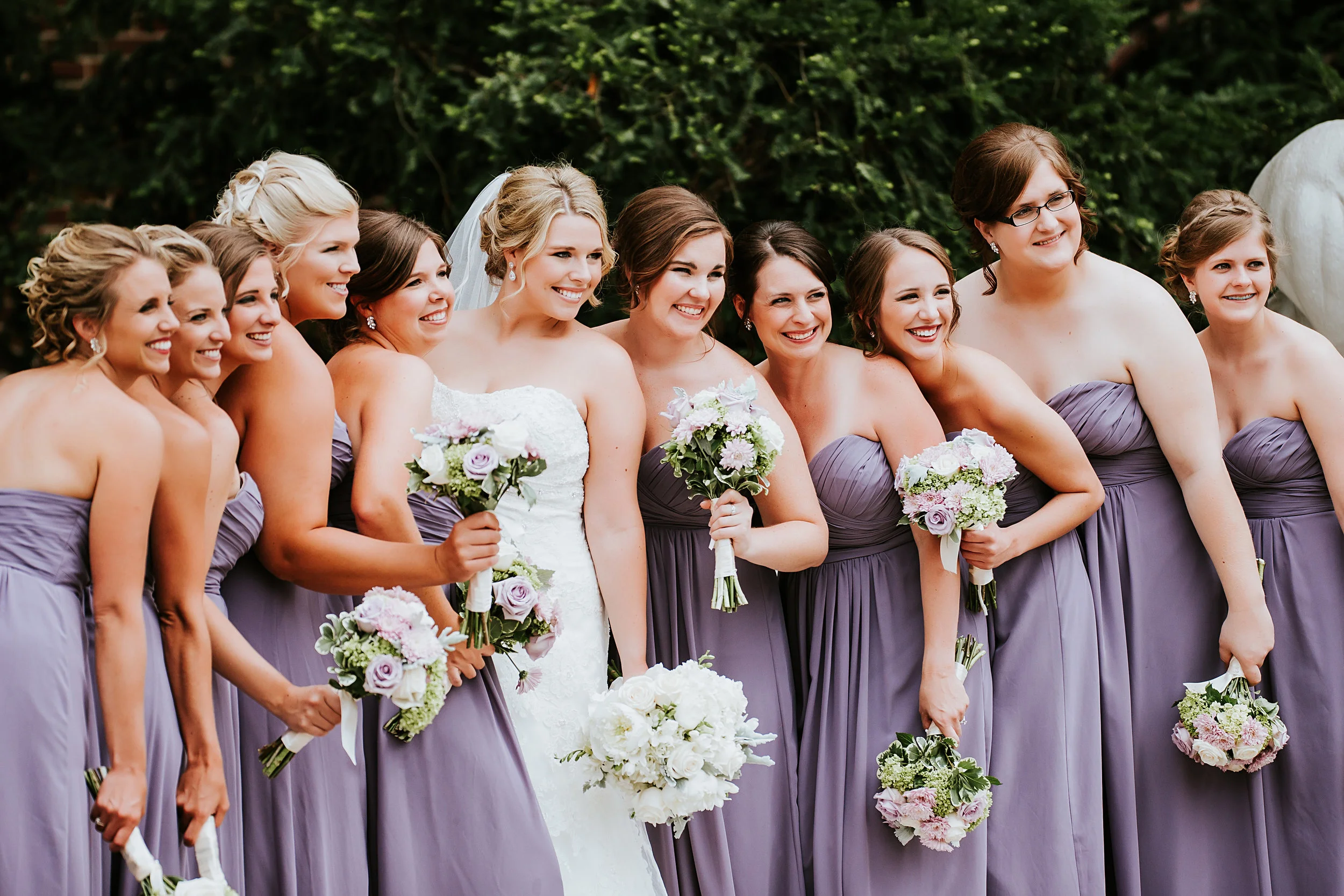 Look at those amazing flowers! This is such a beautiful photo of the bridal party! 