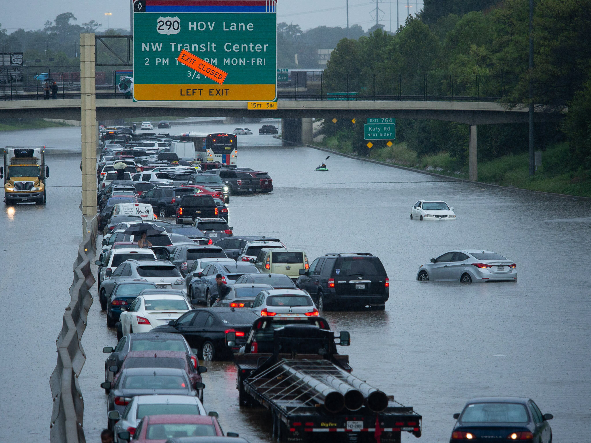 Motorists Stuck On Flooded Highway