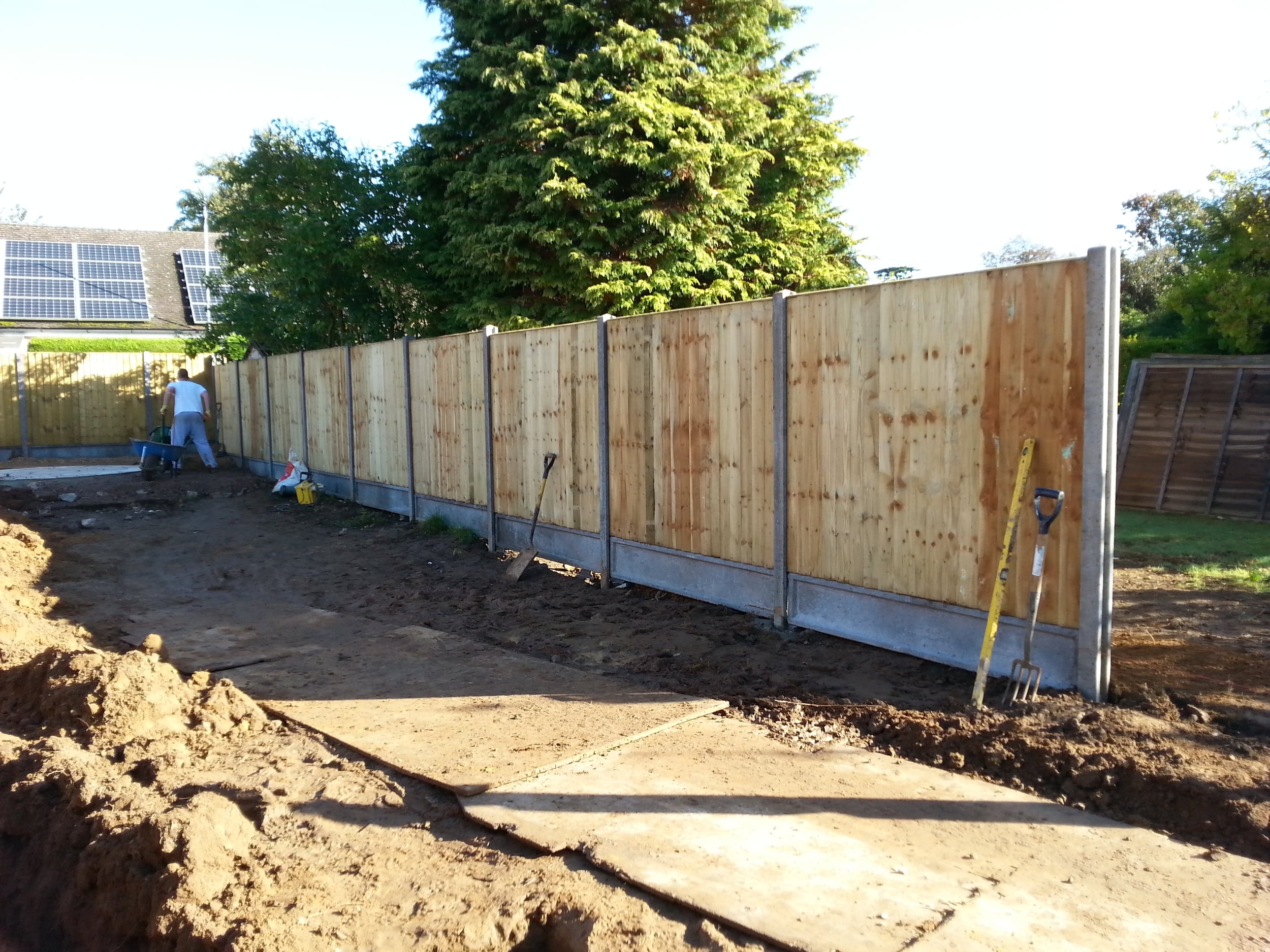 Closeboard panels set on slotted concrete posts and concrete gravel boards, Cookham