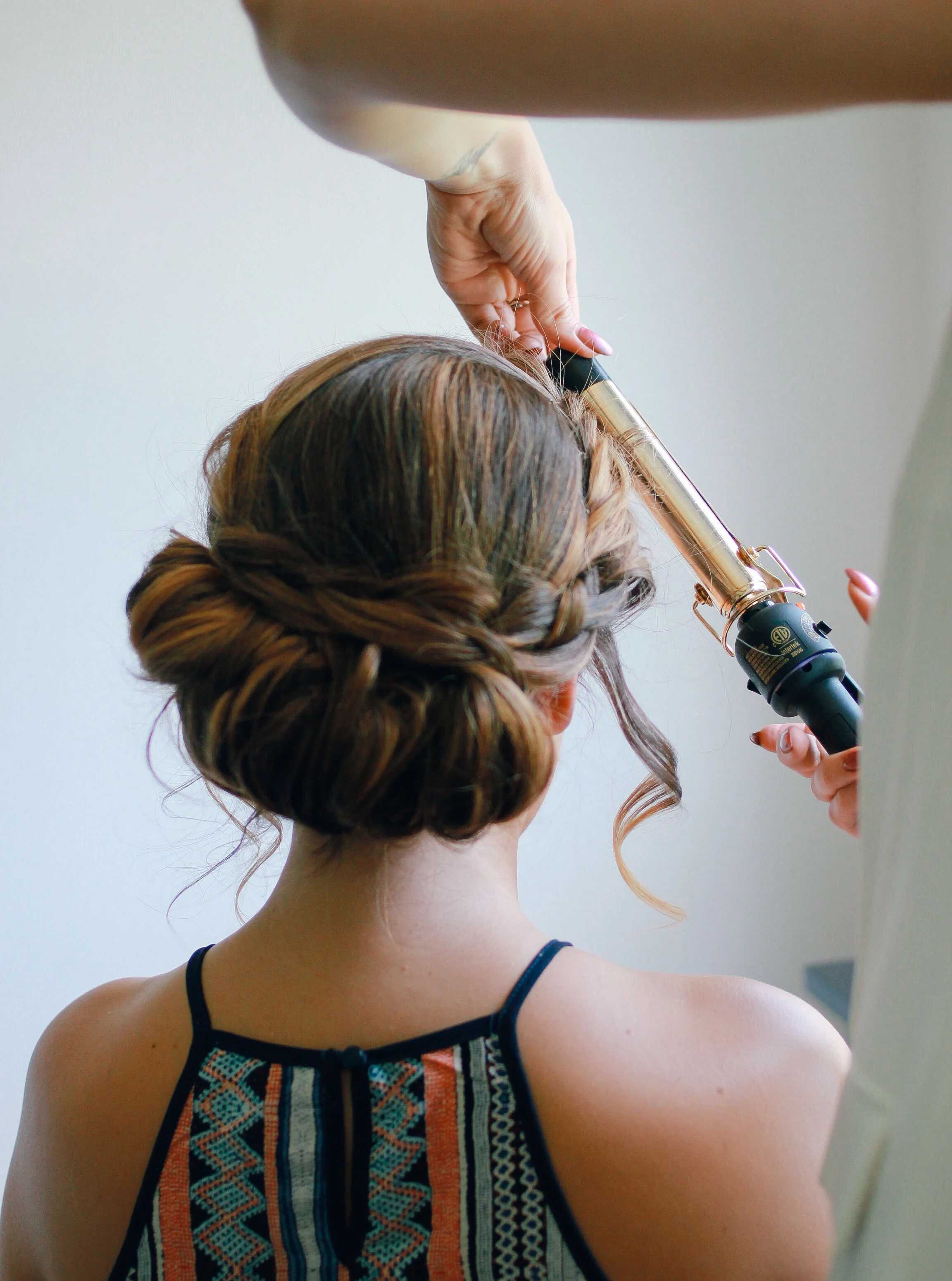 Once curled. You can use Kenra working wax to define and smooth. Afterwards Finish with Kenra #25 spray. 