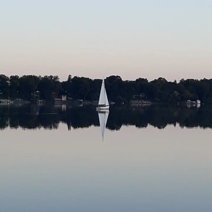 Stan P’s early morning “sail” to the boat ramp to haul his Rhodes 19 after sailing for the 28th season near Alexandria, MN.