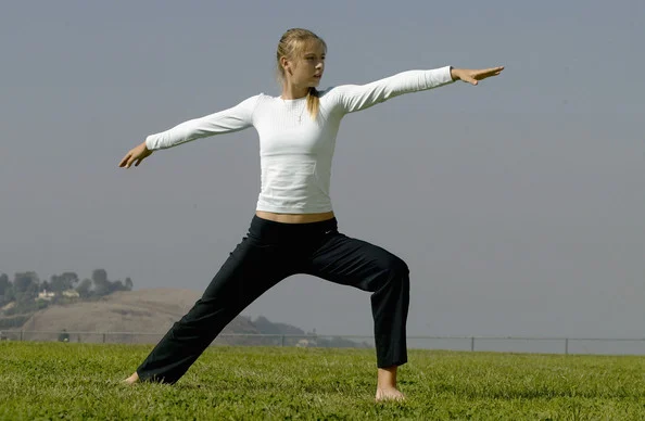 Maria Sharapova in Warrior II pose