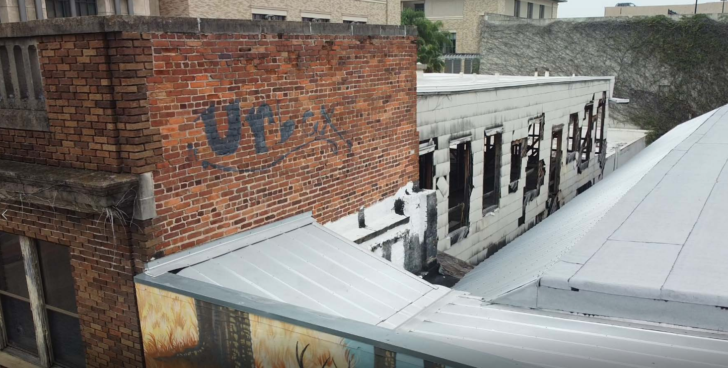View of c.1903 rooming house behind 1923 M&amp;S brick storefront